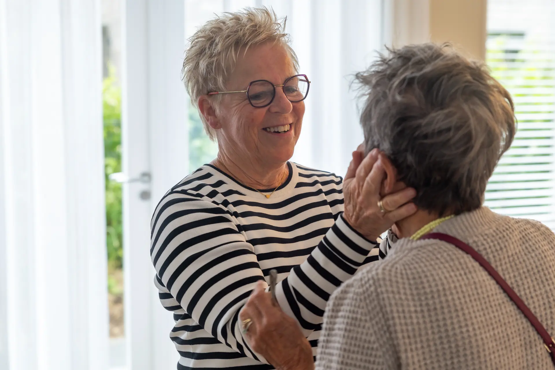 Oud Locatiemanager met bewoner in Het Gastenhuis Roermond